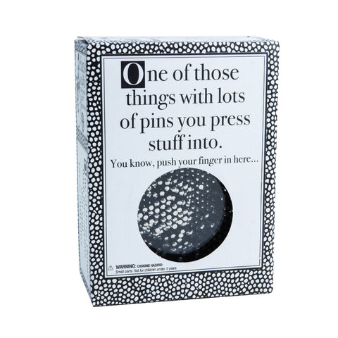 One of those things with lots of pins that you press stuff into